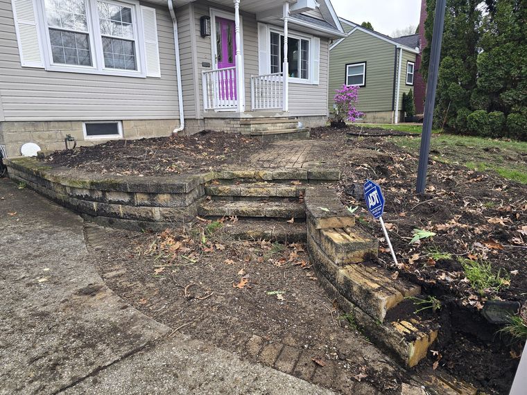 Before: collapsing timber walls and broken steps