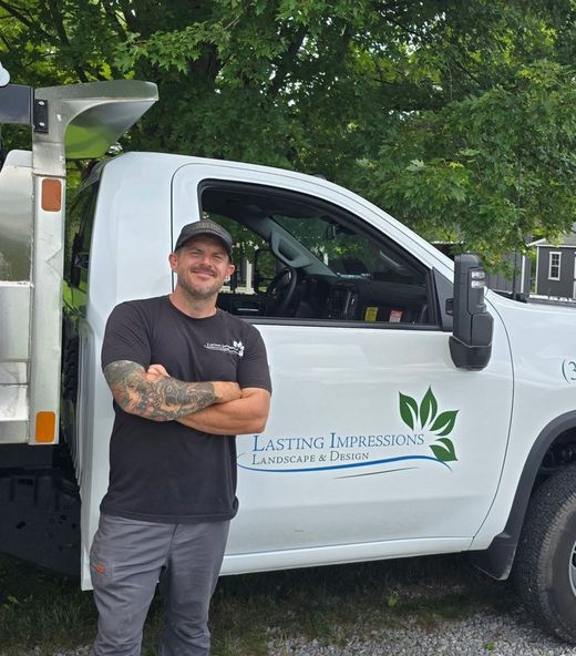 Marcus Peters, owner of Lasting Impressions Landscape & Design, at his truck